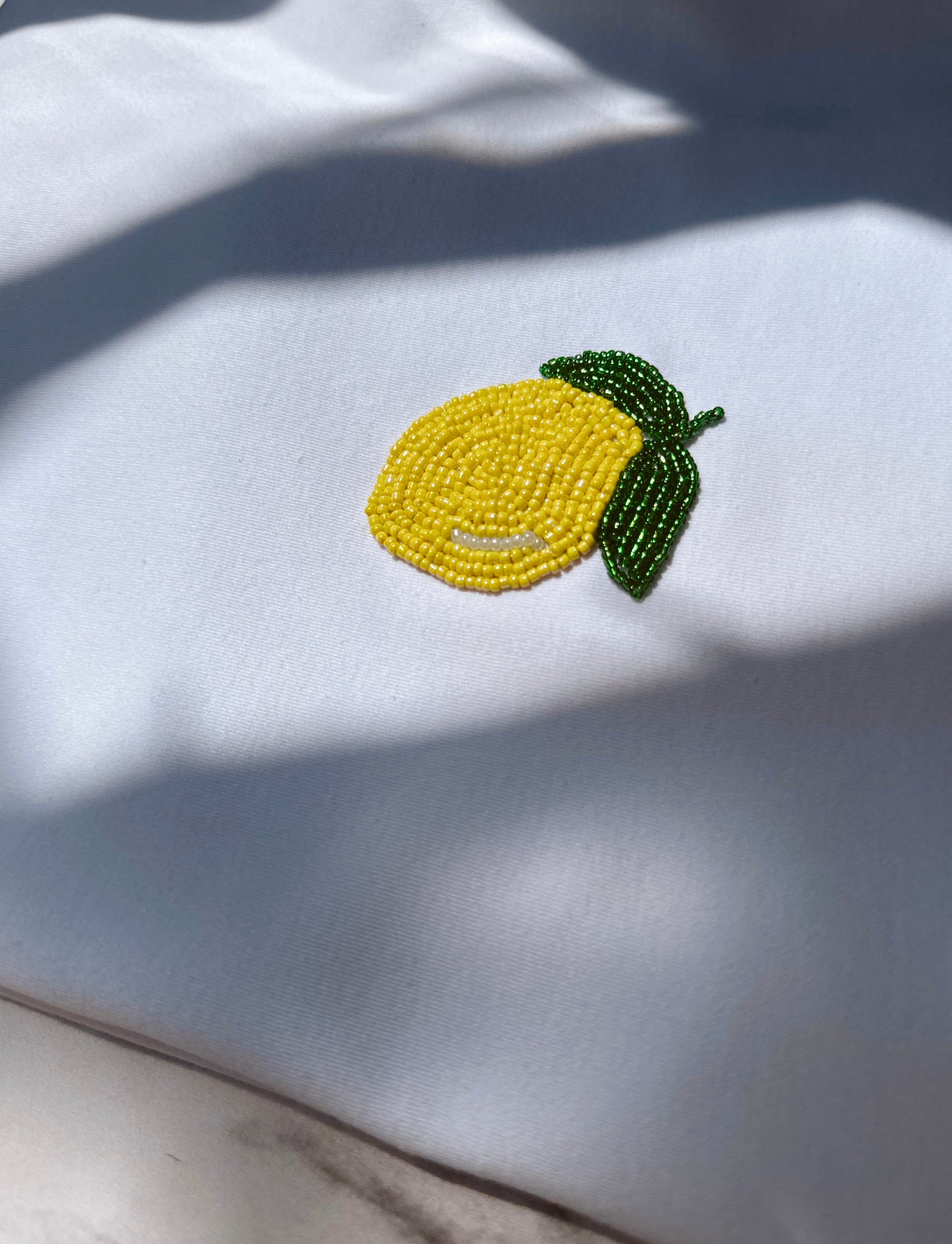 Playera pedrería limón