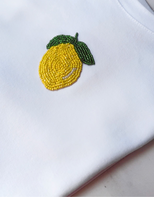 Playera pedrería limón