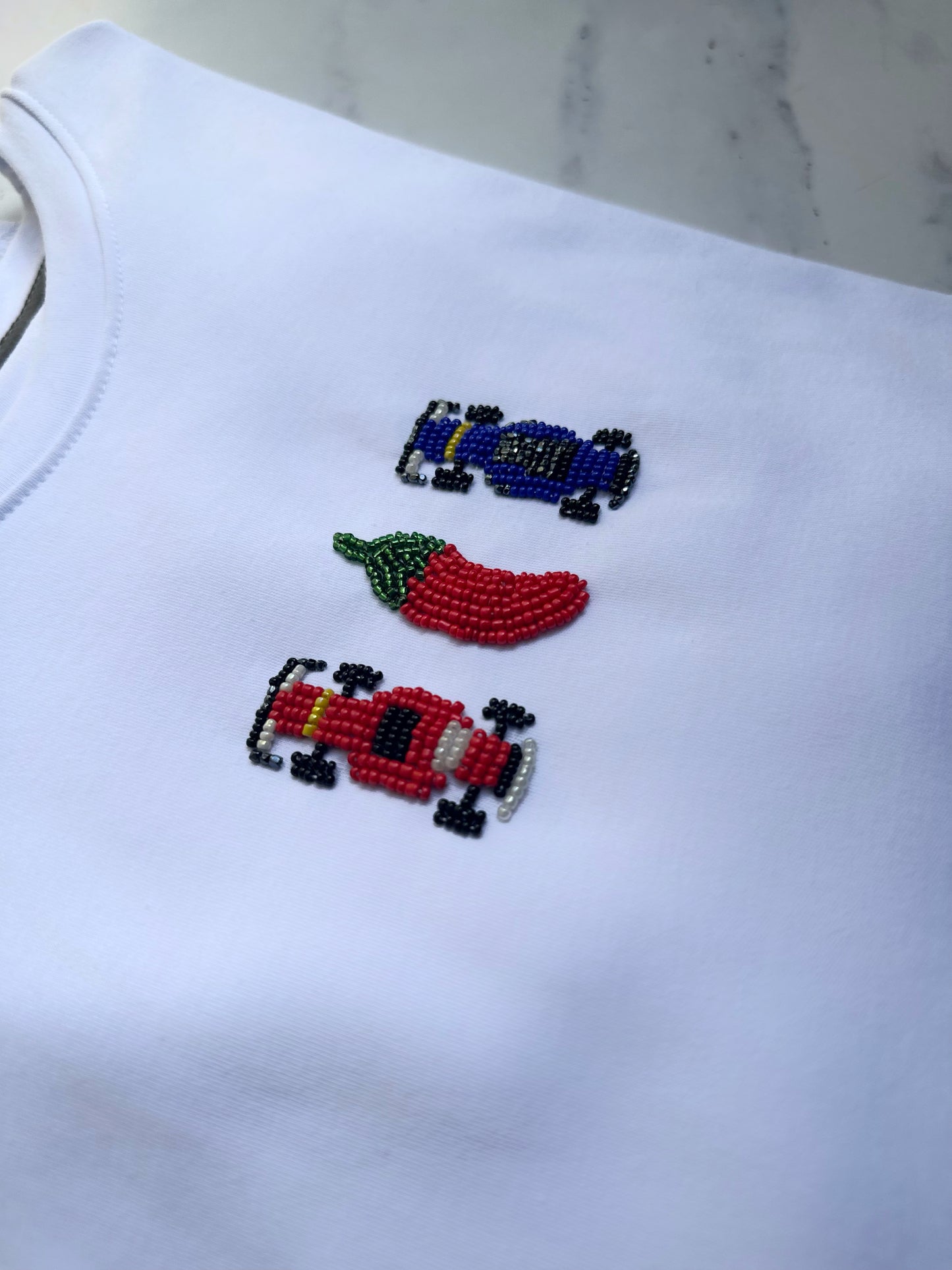 Playera pedrería fórmula 1